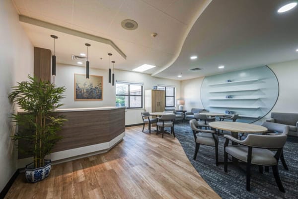 Bright common area with seating and decor