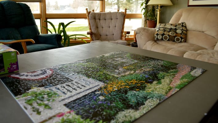 Cozy lounge area with a puzzle on the table