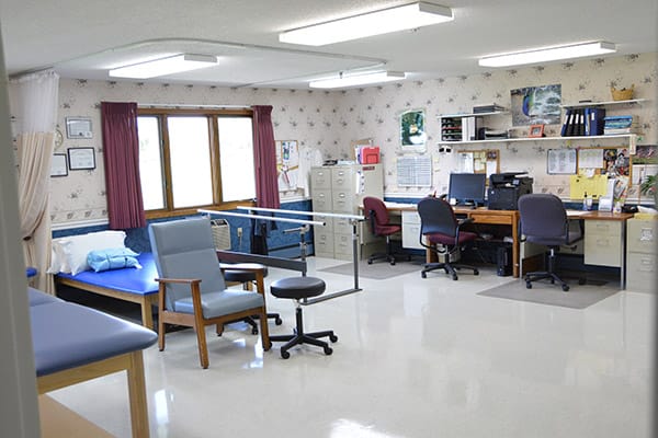 Interior view of a therapy room with equipment