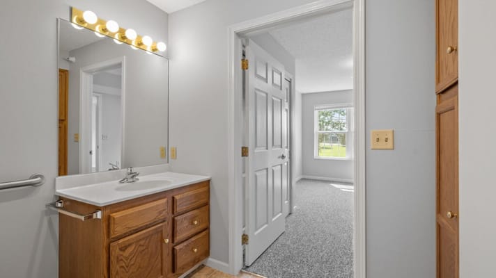 Interior view of a resident bathroom and room