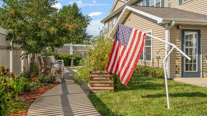 Garden area with a flag and seating