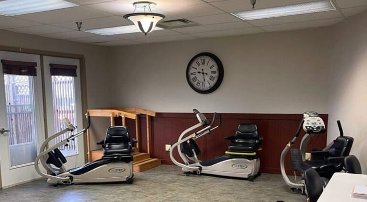 Interior fitness room with exercise equipment