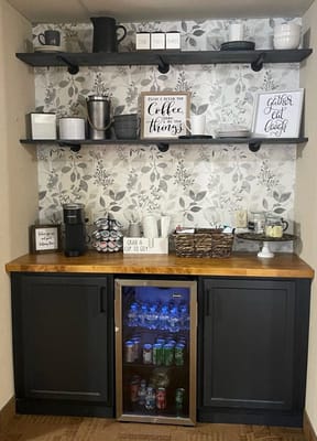 Coffee station with beverages in a common area