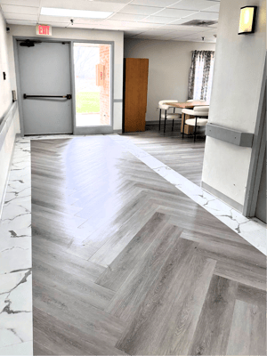 Interior view of a hallway with a seating area