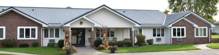 Exterior view of a nursing facility in autumn