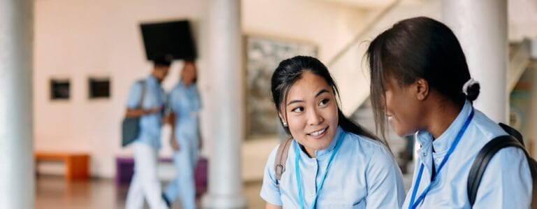 Staff interacting in a bright common area