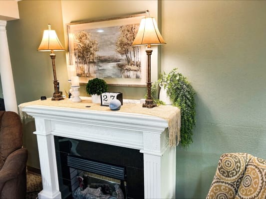 Cozy common area with lamps and artwork