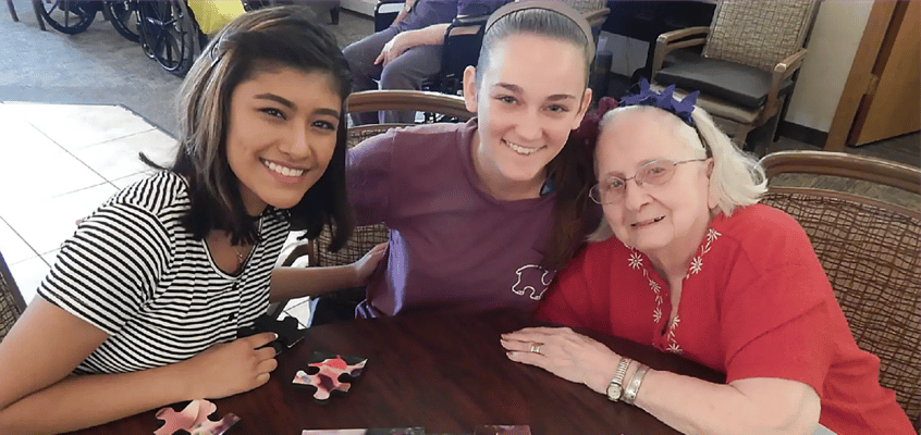 Residents and staff engaged in a fun activity