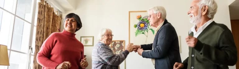 Residents dancing and having fun in a common area