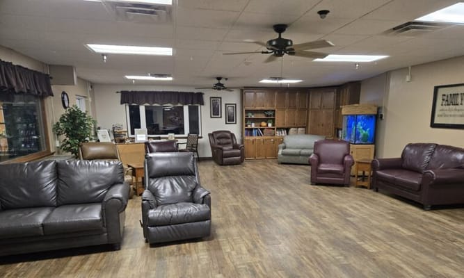 Interior common area with seating and cabinets