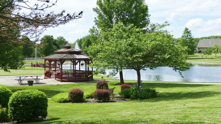 Picturesque gazebo by a serene lake