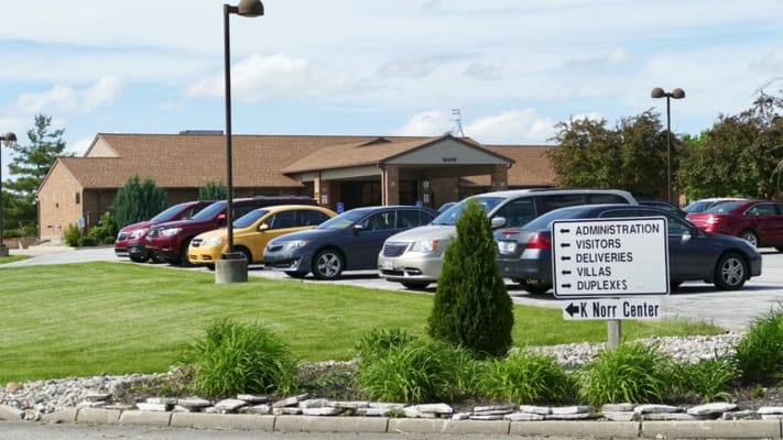 Exterior view of the facility with parking lot