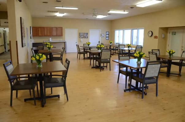 Dining room with tables set for meals