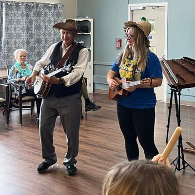 Residents enjoying live music in an activity room