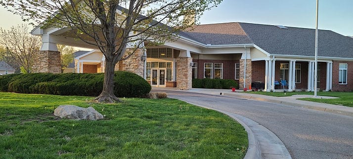 Exterior view of a senior living facility entrance