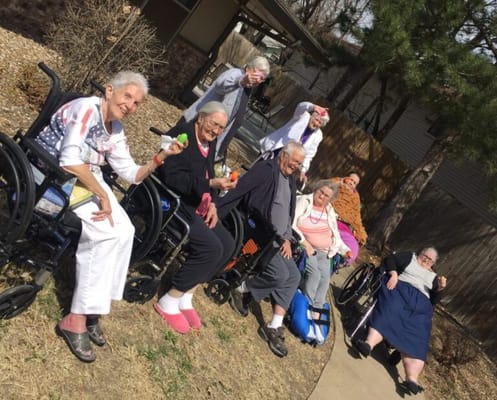 Residents enjoying time outdoors on a sunny day