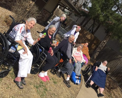 Residents enjoying time outdoors on a sunny day