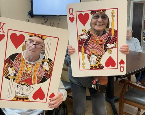 Residents engaged in a fun card-themed activity