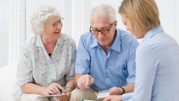 Residents engaging in an interactive activity with staff