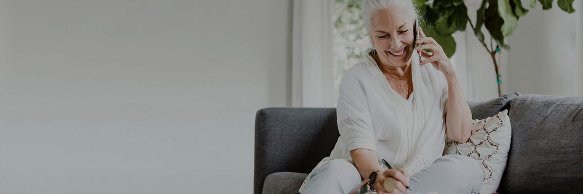 Senior woman engaging in a phone conversation