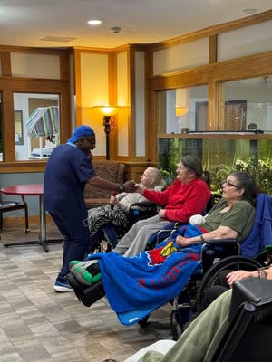 Staff interacting with residents in a common area