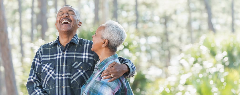 Happy seniors enjoying time together outdoors