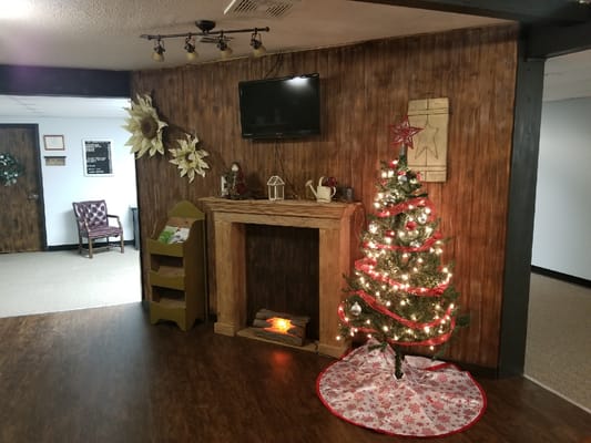 Cozy holiday-themed interior with Christmas tree