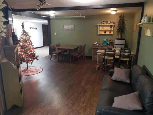 Cozy common area with holiday decorations and seating