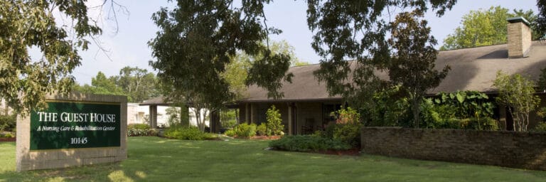 Exterior view of senior living facility with landscaping