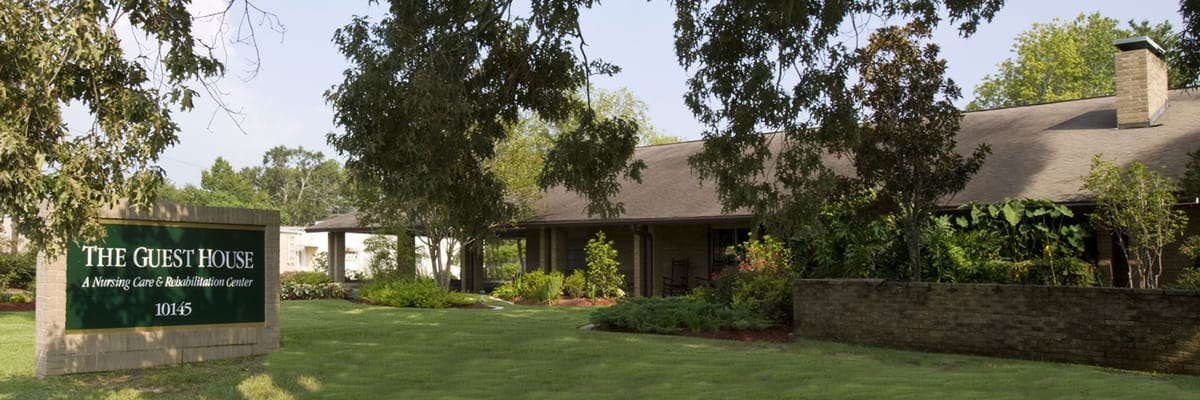 Exterior view of senior living facility with landscaping