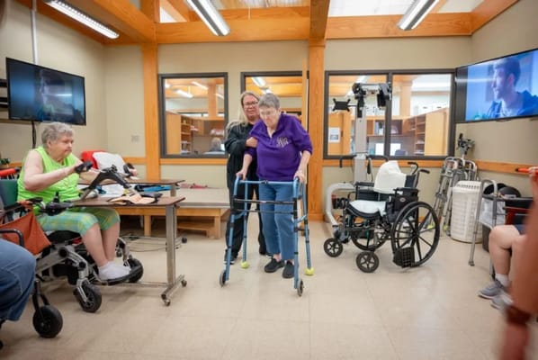 Residents participating in a rehabilitation activity in a common area
