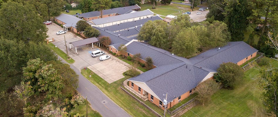 Aerial view of the assisted living facility with green space