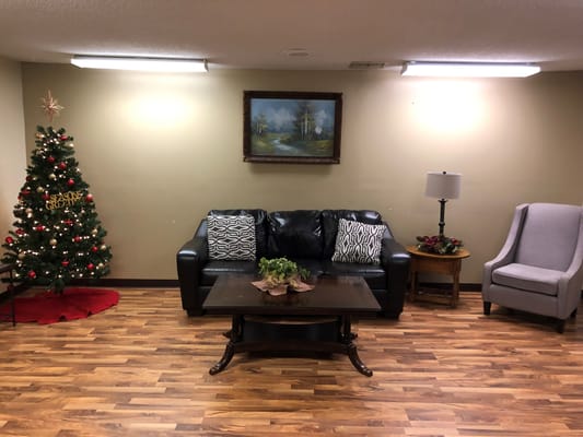 Cozy common area with holiday decor and seating