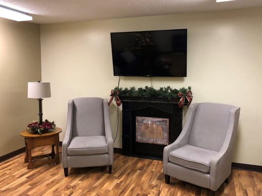 Cozy common area with chairs and decorations