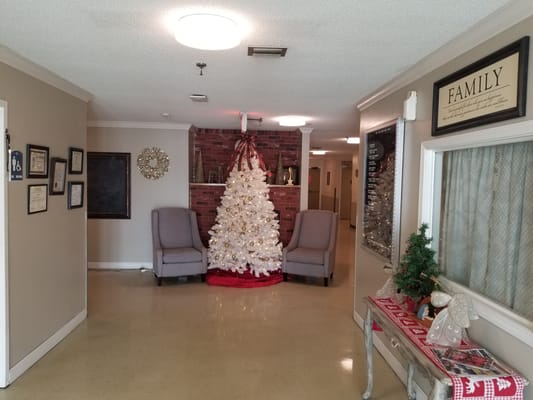 Decorated lobby area with a Christmas tree