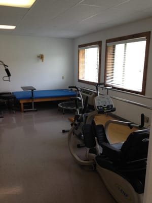 Interior view of a fitness room with exercise equipment