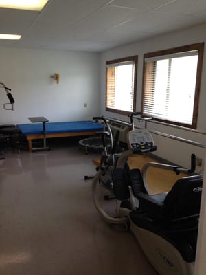 Interior view of a fitness room with exercise equipment
