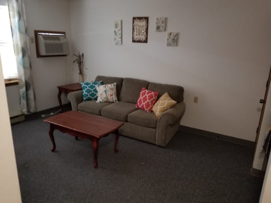 Cozy living space with a couch and decorative pillows
