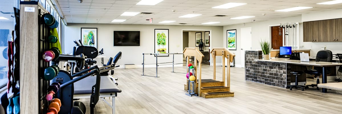 Interior view of a therapy room with exercise equipment