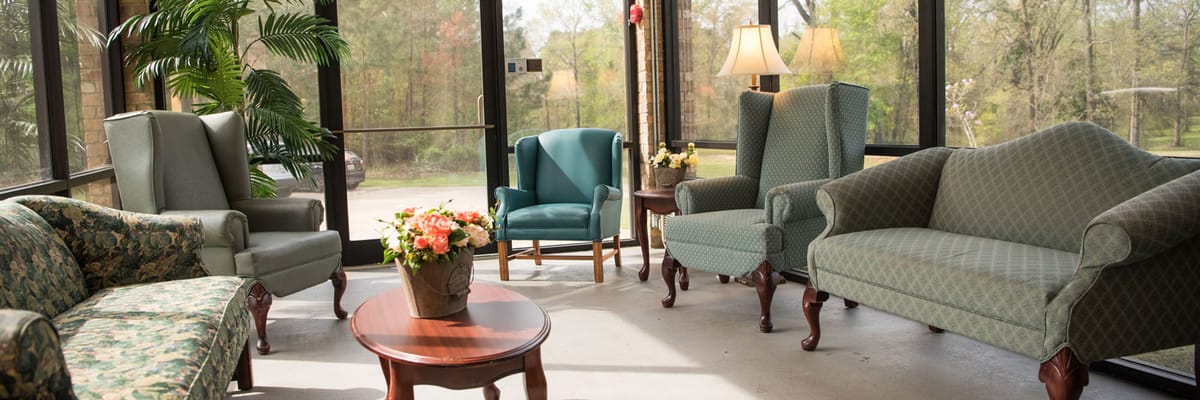 Bright and inviting sunroom with comfortable seating
