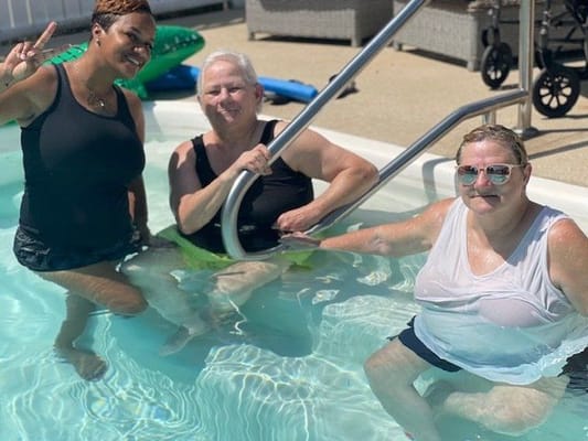 Residents enjoying a fun activity in the pool