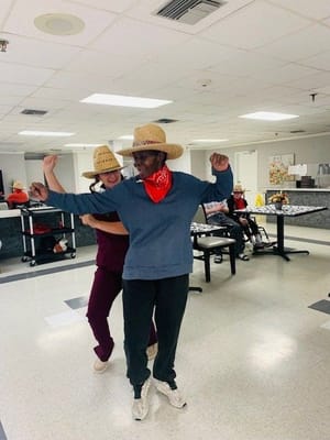 Residents dancing during an activity in a common area