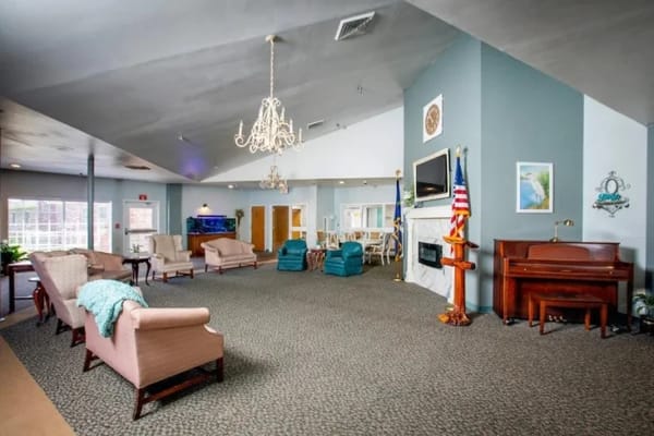 Interior view of a cozy common area with seating