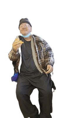 Senior man enjoying a meal with a smile