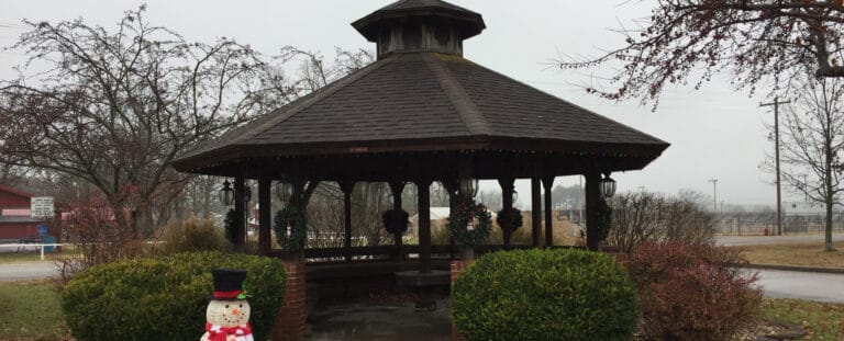 Covered gazebo in an outdoor space with decorations