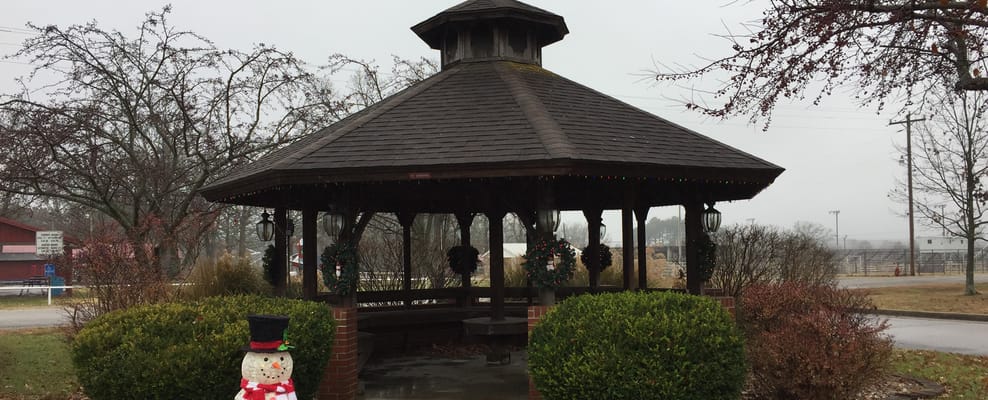Covered gazebo in an outdoor space with decorations