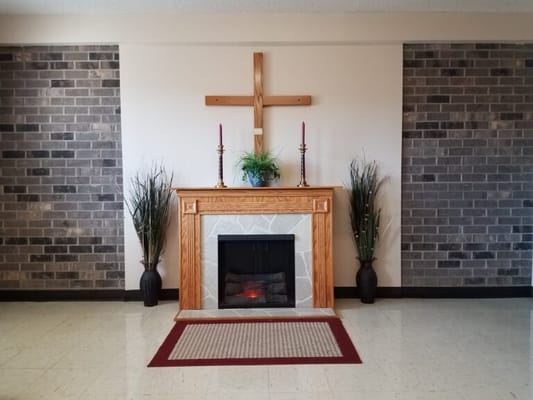 Decorative fireplace in a facility common area