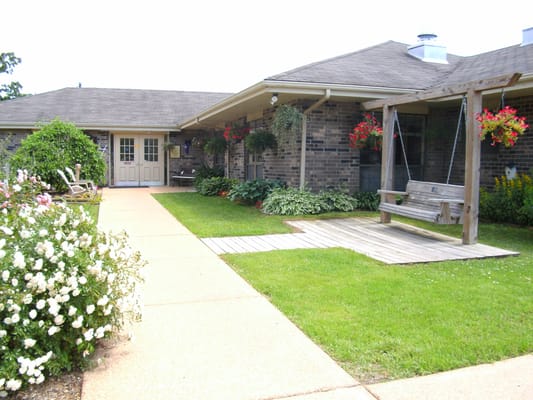 Beautiful garden area with seating and flowers
