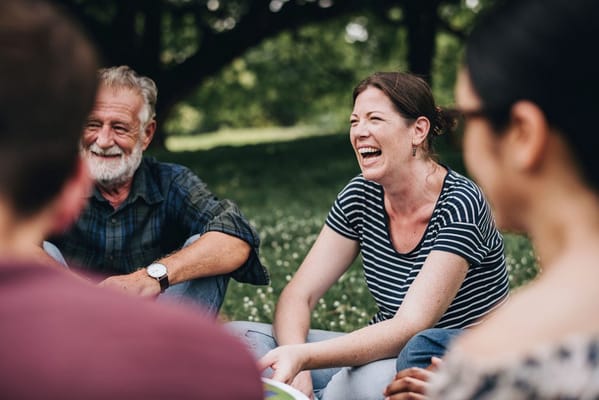 Residents enjoying a group activity outdoors