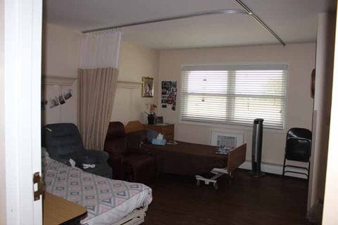 Interior view of a resident's room with furniture